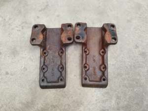 Paar sokkels (voor) John Deere